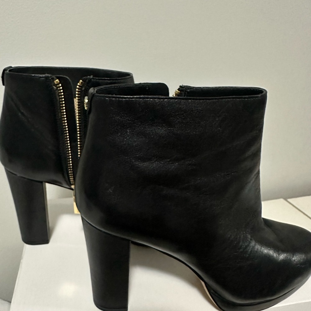 Michael Kors high heeled boots. Worn 3 times so carefully.